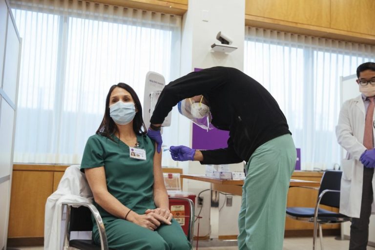 U.S. reviews Moderna coronavirus shot as Pfizer vaccinations expand across country