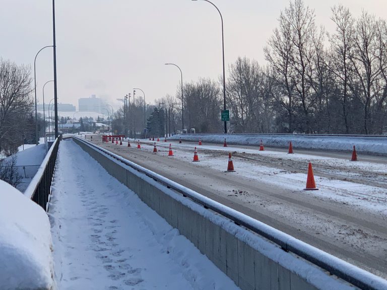 Section of Northwest Calgary road closed after fire set beneath bridge