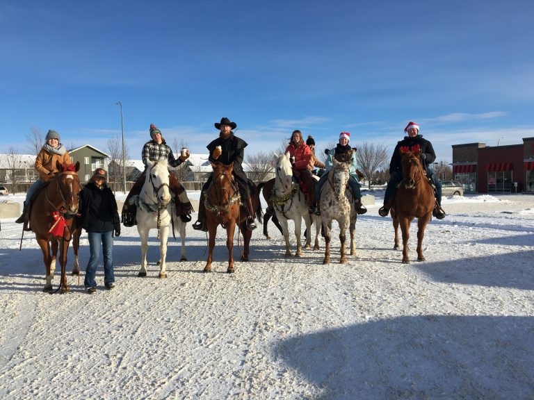 Holiday horseback riders spread Christmas cheer in Lethbridge