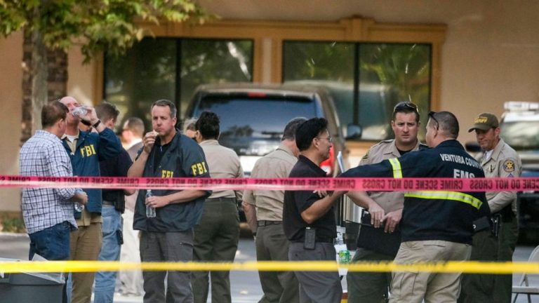 Report: Slain officer tripped during California bar massacre
