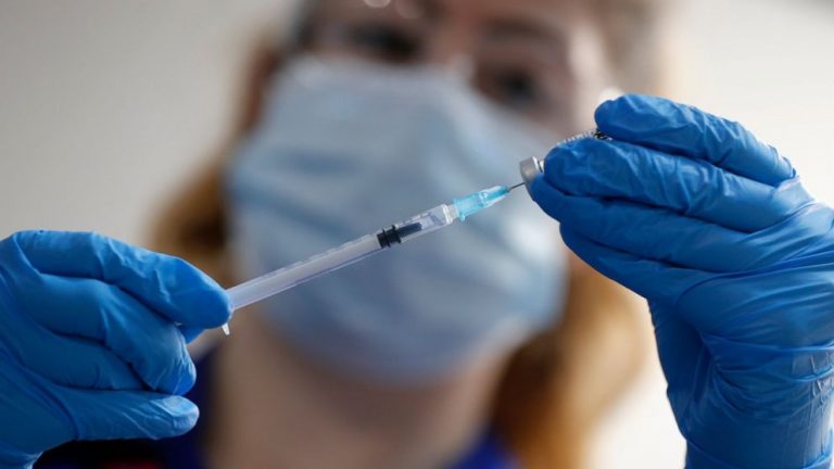 UK investigates possible allergic reactions to COVID-19 shot