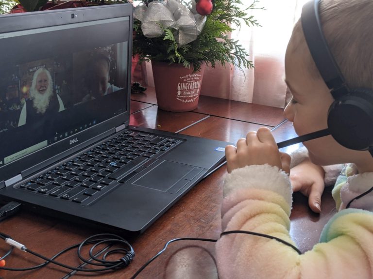 Santa brings Christmas cheer by virtually meeting with Edmonton kids