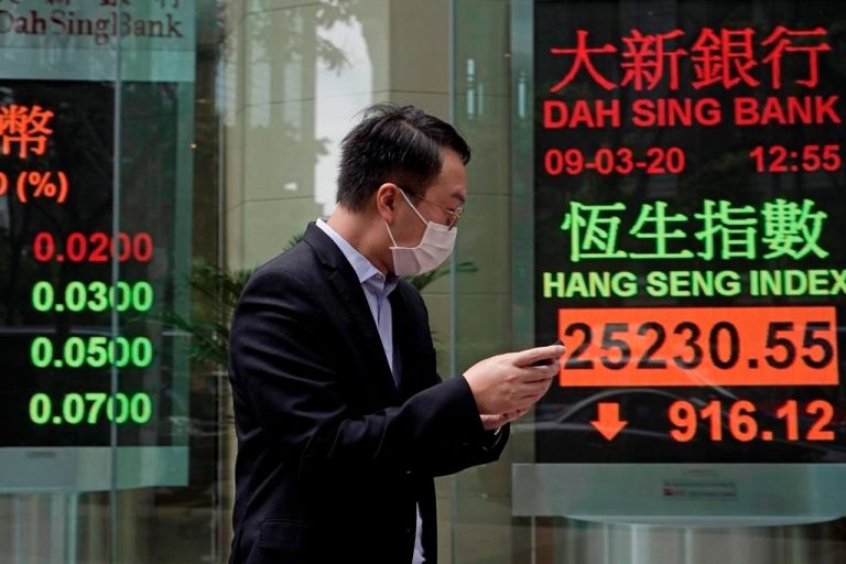 Global stocks fall amid fears of new coronavirus strain