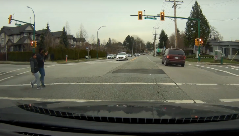 Video shows van, allegedly fleeing Burnaby RCMP, speed through red light