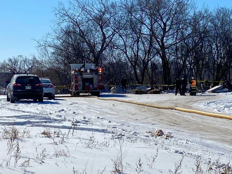 1 person dead after homeless camp catches fire near Disraeli Freeway