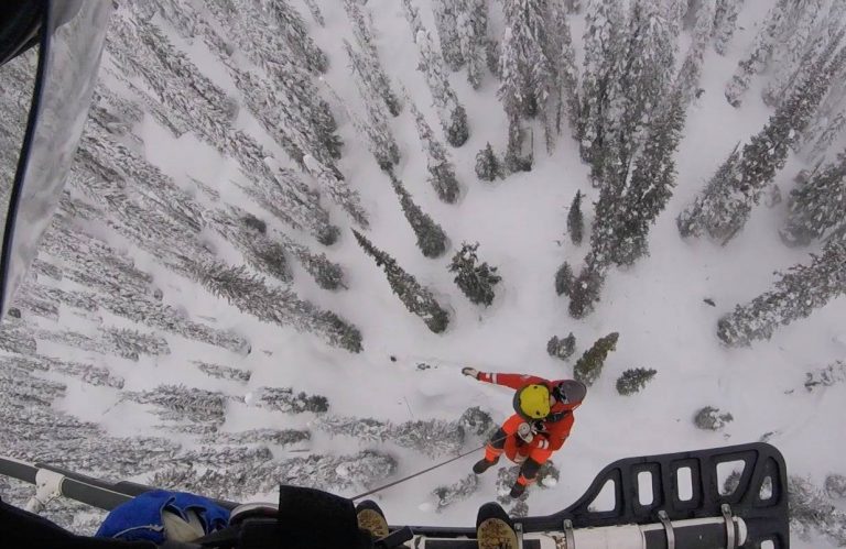 Okanagan snowmobiler rescued by helicopter after suffering back injury