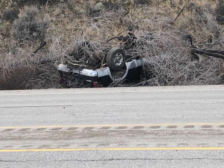 Rollover slowing traffic near Summerland