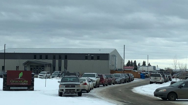 Who’s responsible for enforcing COVID-19 restrictions in Alberta?