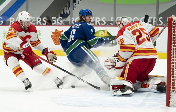 Markstrom magnificent as Flames hand Canucks 6th loss in a row
