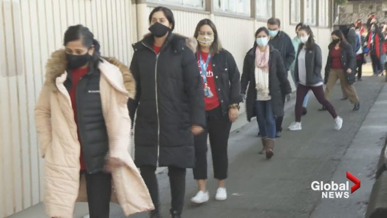 Surrey elementary school teachers walk in solidarity as concern around COVID-19 variants grows