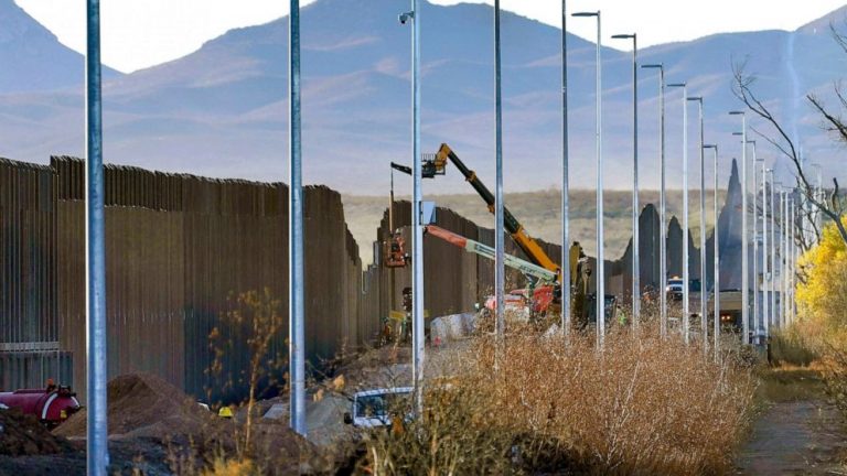 Biden asks high court to put off wall, asylum cases