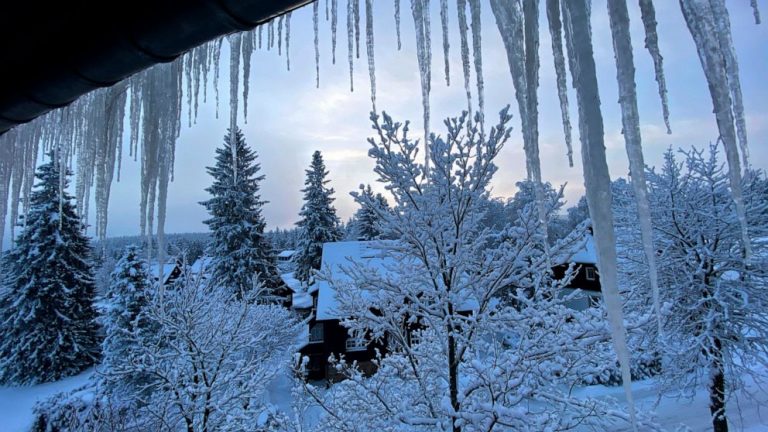 Eiffel Tower needs blowtorch for ice as snow blankets Europe