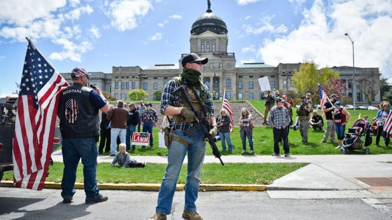 States remain split on guns in capitols after armed protests