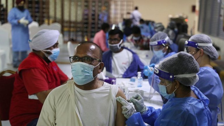 In Dubai’s COVID vaccine scramble, Sikhs serve doses to all