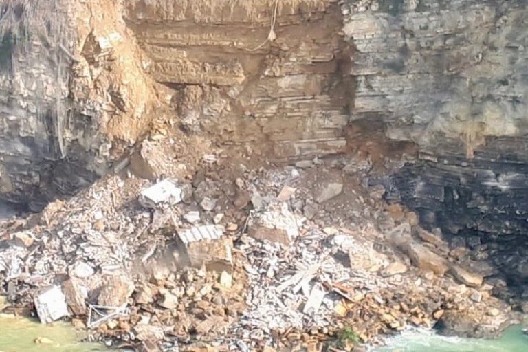 Italy landslide dumps hundreds of cemetery coffins into the sea