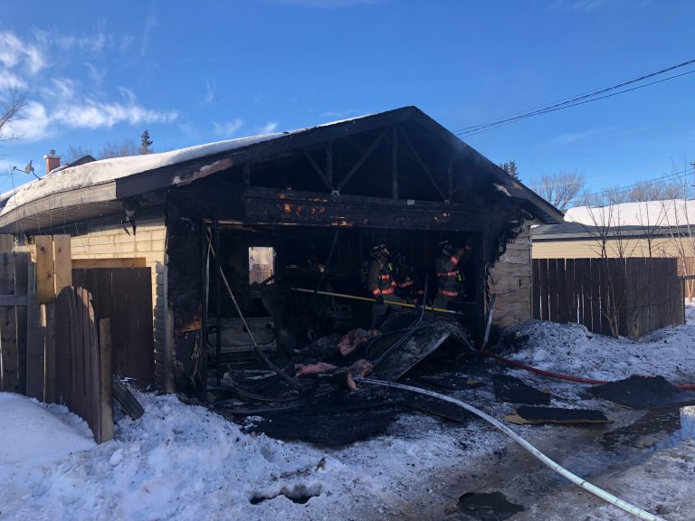 Saskatoon fire crews battle garage blaze in Hudson Bay Park neighbourhood on Saturday