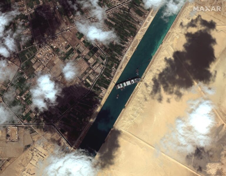 2 tugboats speed to Egypt’s Suez Canal to help free huge container ship