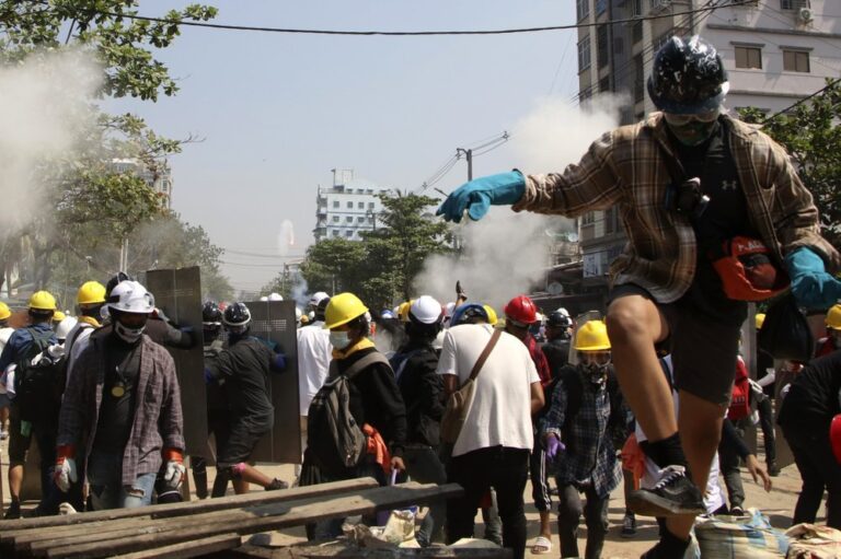 Myanmar police fire on demonstrators in former capital as protests continue
