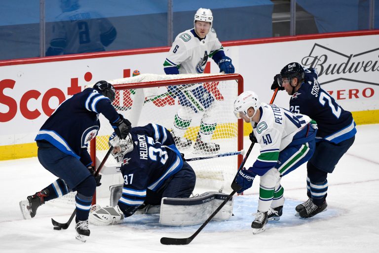 First period puck luck leads Vancouver Canucks to 4-0 win over Winnipeg Jets