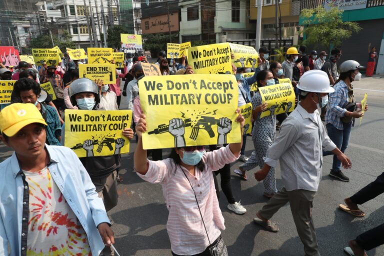 Myanmar coup opponents defy curfew, hold funerals for slain protesters