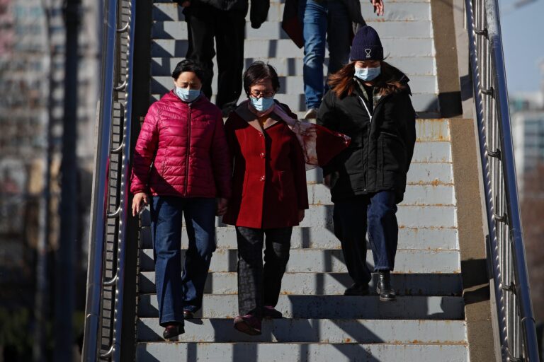 China urges relaxed public to get COVID-19 vaccine