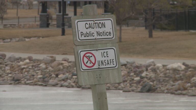 12-year-old boy rescued by friends after falling through Lethbridge lake