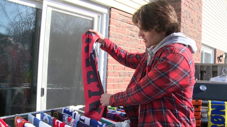 Whitby man trades Canadian maple syrup for football scarves