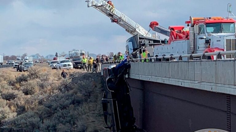 Rescuers save 2 from pickup dangling over deep Idaho gorge