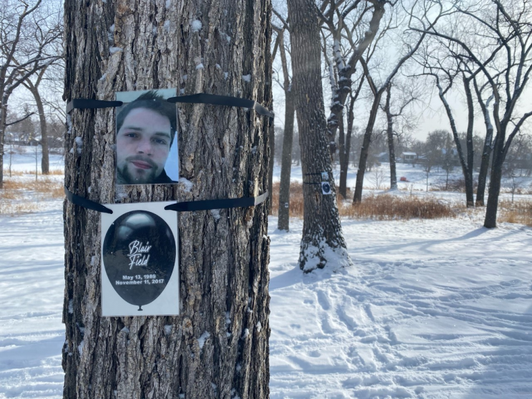Overdose Awareness Manitoba lines Churchill Drive with black balloons to remember lives lost