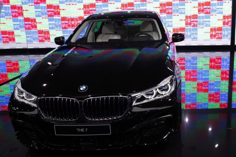 Man drove dealership car to bank robbery, then offered cash for a BMW