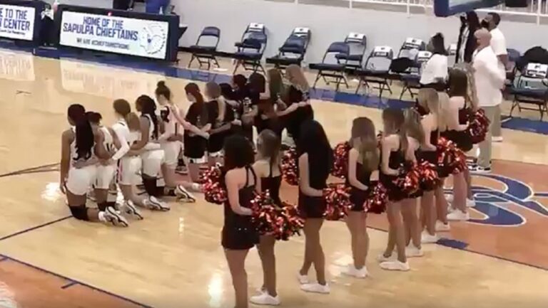 Announcer calls girls’ basketball team racial slur as players kneel during anthem