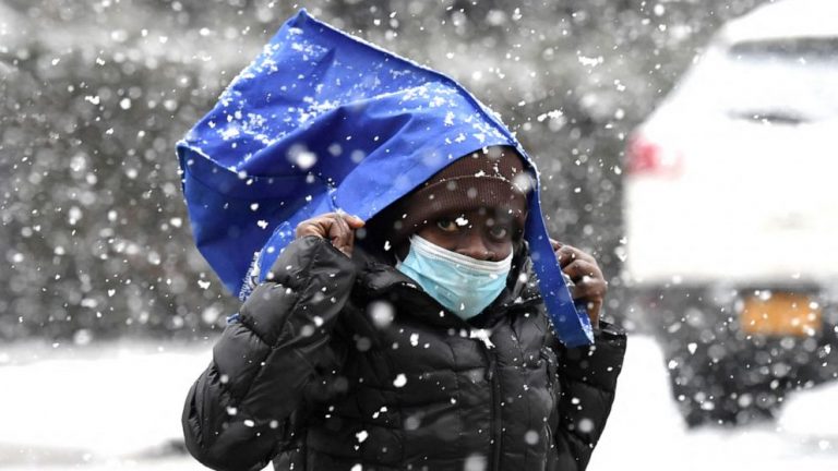 Major flooding continues in South as Northeast hit with cold blast