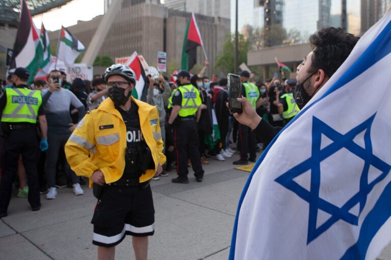 Tensions flare at Israel and Palestinian demonstrations in Toronto, Montreal
