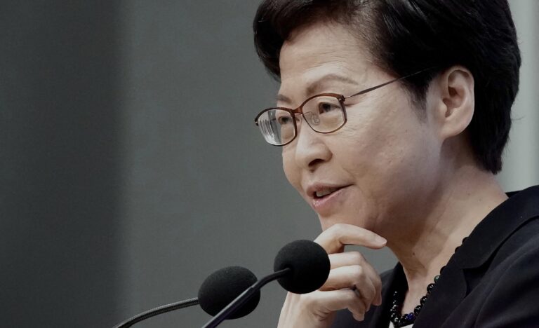 Hong Kong leader urges adults to monitor teens, report those who break security law