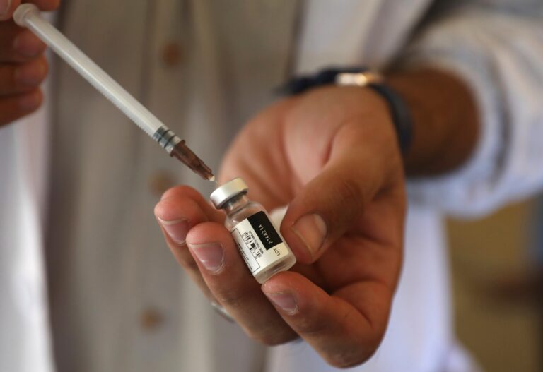 WHO says extra vaccines should go to poor nations, not booster shots