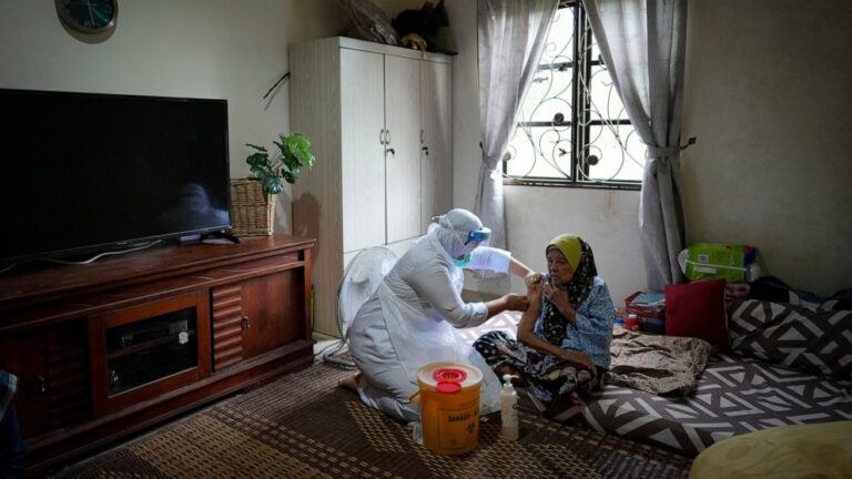 Malaysia shuts vaccination center after 204 staff infected