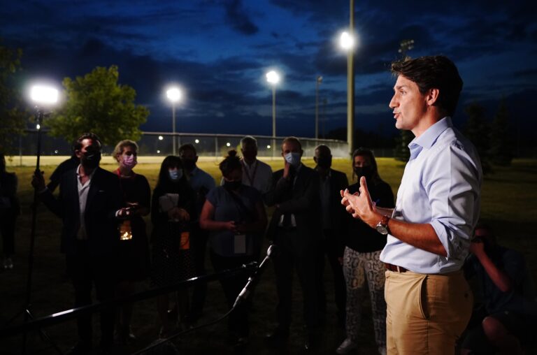 Trudeau vows to regulate oil and gas emissions, electric car sales