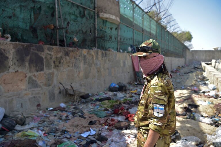 Nations scramble to airlift Afghans after Kabul explosions kill more than 100