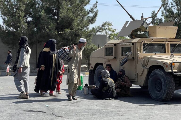 Taliban deploy more forces to seal off Kabul airport after suicide attack kills 182