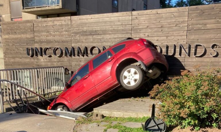 Car nearly crashes into Halifax coffee shop after swerving to avoid collision