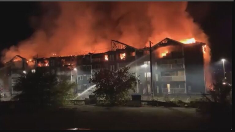 Fire burns through Brandon condo building