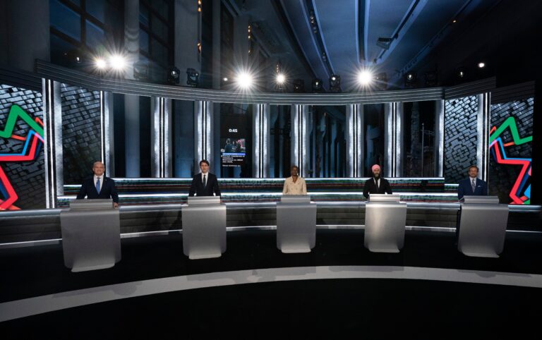 Federal leaders trade barbs on COVID-19 plans, vaccinations in French election debate