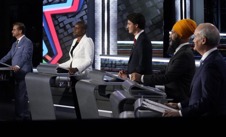Trudeau on defence as opposition leaders fight for points in English election debate