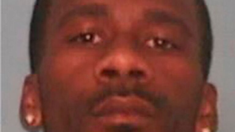 Suspect in deaths of 4 found in SUV surrenders in Arizona