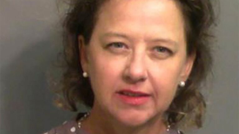 Ex-prosecutor charged in Ahmaud Arbery case booked at jail