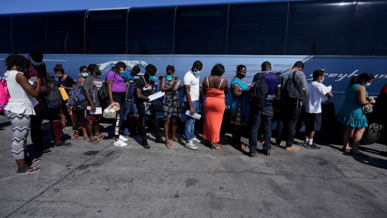 Officials: Many migrants from border camp staying in US