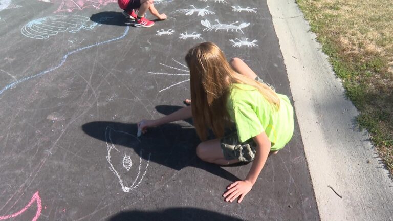 West Kelowna, B.C. neighbourhood kids cheer up woman with chalk creations