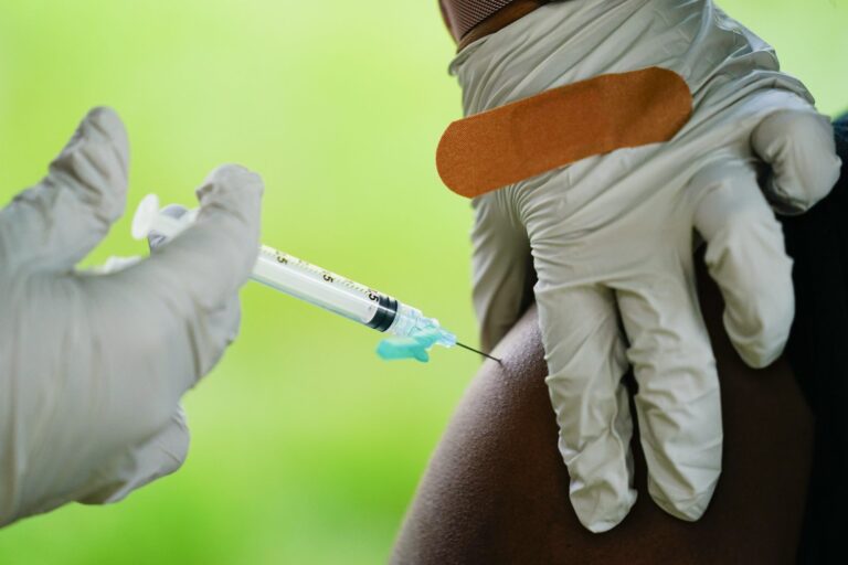 18 states sue to stop Biden’s COVID-19 vaccine mandate for federal contractors
