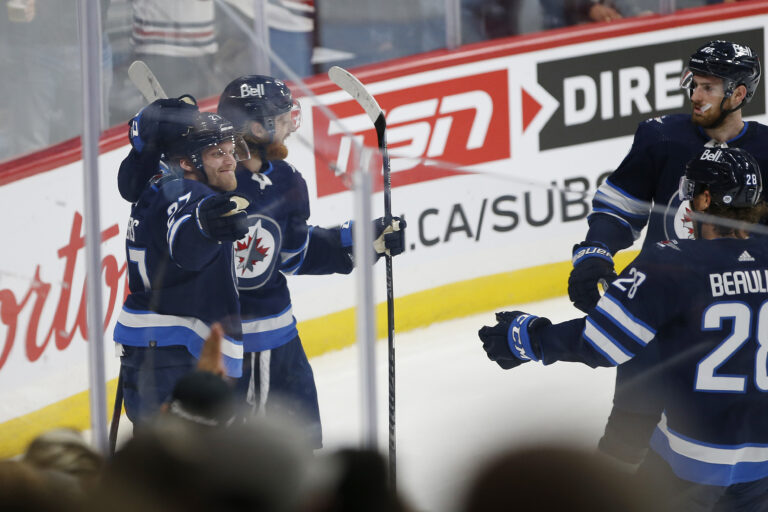 Ehlers scores twice as Jets down Flames in feisty preseason battle
