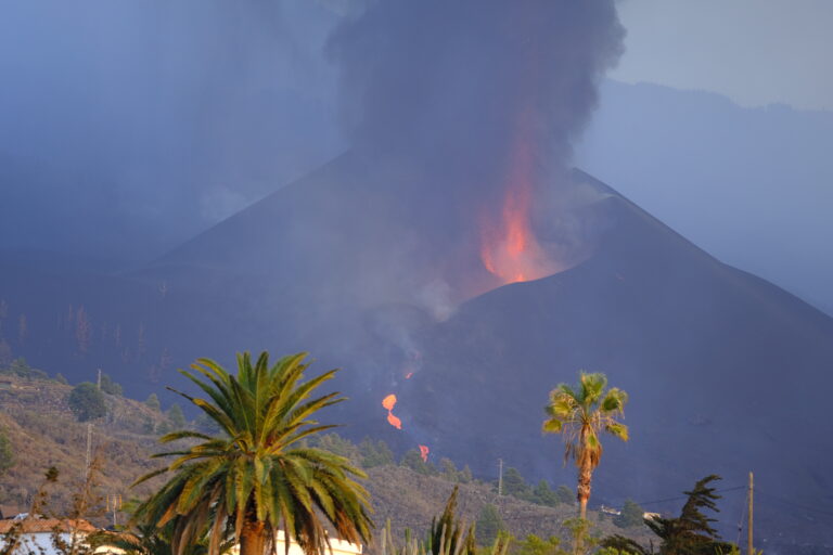 La Palma volcano prompts lockdown as lava destroys cement plant